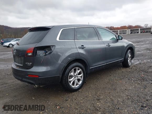 ✅ 2015 Mazda CX-9 Touring • VIN: JM3TB3CV0F0460596 • Lot: 43662804. Listed on IAAI with 143,368 mi. Free auction sales archive from the USA and detailed vehicle history report at DreamBid. Image 4.