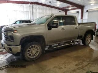 ✅ 2024 Chevrolet Silverado 2500HD LTZ • VIN: 2GC4YPE77R1137737 • Lot: 69303235. Listed on Copart with 36,403 mi. Free auction sales archive from the USA and detailed vehicle history report at DreamBid. Image 1.