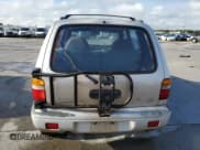 ✅ 1997 Kia Sportage • VIN: KNDJA7235V5538866 • Lot: 79728424. Wystawiony na Copart z przebiegiem 117 230 mil. Bezpłatny archiwum sprzedaży aukcyjnych z USA i szczegółowy raport historii pojazdu na DreamBid. Zdjęcie 6.