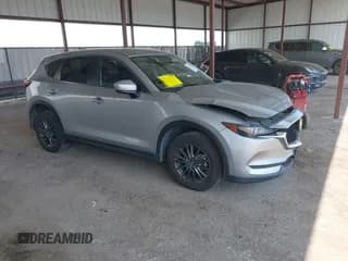 ✅ 2020 Mazda CX-5 Touring • VIN: JM3KFACM8L1770738 • Lot: 43237475. Wystawiony na IAAI z przebiegiem 96 169 mil. Bezpłatny archiwum sprzedaży aukcyjnych z USA i szczegółowy raport historii pojazdu na DreamBid. Zdjęcie 1.