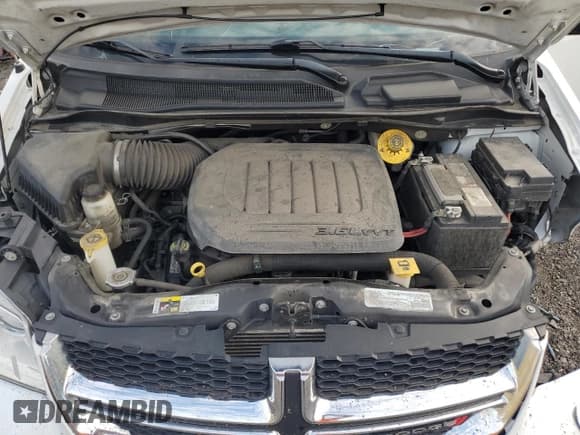 ✅ 2019 Dodge Grand Caravan SE • VIN: 2C4RDGBG5KR737606 • Lot: 82572365. Wystawiony na Copart z przebiegiem 101 461 mil. Bezpłatny archiwum sprzedaży aukcyjnych z USA i szczegółowy raport historii pojazdu na DreamBid. Zdjęcie 12.