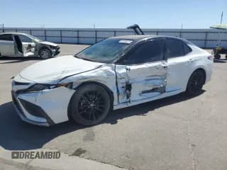 ✅ 2021 Toyota Camry Hybrid XSE • VIN: 4T1K31AK0MU028493 • Lot: 68765375. Listed on Copart with 125,781 mi. Free auction sales archive from the USA and detailed vehicle history report at DreamBid. Image 1.