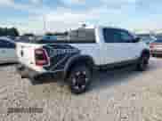 2020 Ram 1500 Rebel z VIN 1C6SRFLM1LN231228, wystawiony jako Copart lot #58342265 z przebiegiem 133 097 mil mil oraz Czysty tytuł • Clean title. Historia ofert i sprzedaży dostępna na DreamBid. Obrazek 3.