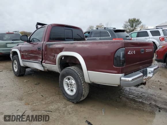 2000 Dodge Dakota Sport z VIN 1B7GG26N8YS795890, wystawiony jako Copart lot #78523764 z przebiegiem 214 933 mil mil oraz Szkoda całkowita • Salvage title. Historia ofert i sprzedaży dostępna na DreamBid. Obrazek 2.