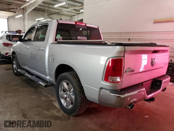 2014 Ram 1500 Big Horn with VIN 1C6RR7LT1ES296595, listed as a Copart auction lot 67928565 with 136,303 mi miles and Salvage title. Bid and sale history available at DreamBid. Image 2.