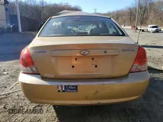 2004 Hyundai Elantra GLS z VIN KMHDN46D14U721426, wystawiony jako Copart lot #82985934 z przebiegiem Nie podano mil oraz Szkoda całkowita • Salvage title. Historia ofert i sprzedaży dostępna na DreamBid. Obrazek 6.