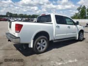 ✅ 2011 Nissan Titan SL • VIN: 1N6AA0EC9BN323597 • Lot: 68928145. Listed on Copart with 82,694 mi. Free auction sales archive from the USA and detailed vehicle history report at DreamBid. Image 3.