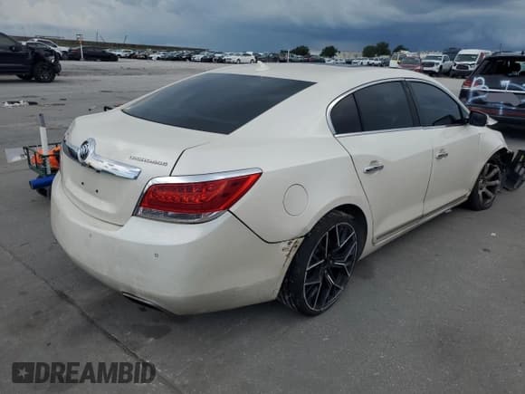 ✅ 2013 Buick LaCrosse Touring • VIN: 1G4GJ5E38DF217547 • Lot: 69124145. Wystawiony na Copart z przebiegiem 153 806 mil. Bezpłatny archiwum sprzedaży aukcyjnych z USA i szczegółowy raport historii pojazdu na DreamBid. Zdjęcie 3.