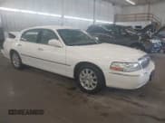 ✅ 2010 Lincoln Town Car Signature Limited • VIN: 2LNBL8CV9AX615800 • Lot: 43277739. Listed on IAAI with 141,130 mi. Free auction sales archive from the USA and detailed vehicle history report at DreamBid. Image 1.