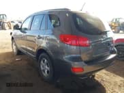 ✅ 2009 Hyundai Santa Fe GL • VIN: 5NMSG73E79H263961 • Lot: 41419880. Listed on IAAI with 165,964 mi. Free auction sales archive from the USA and detailed vehicle history report at DreamBid. Image 3.