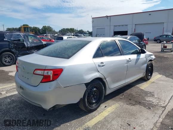 2014 Toyota Camry L with VIN 4T1BF1FK1EU765218, listed as a IAAI auction lot 43211127 with 151,964 mi miles and . Bid and sale history available at DreamBid. Image 4.