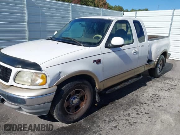 ✅ 1999 Ford F-150 XL • VIN: 2FTRX07W2XCA60118 • Lot: 43705361. Listed on IAAI with 274,573 mi. Free auction sales archive from the USA and detailed vehicle history report at DreamBid. Image 2.