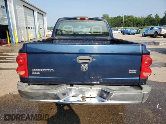 2005 Dodge Dakota SLT с VIN 1D7HE48N95S308572, выставлен на аукционе Copart как лот 58849535 с пробегом 170 991 миль миль и Списание • Salvage title. История ставок и продаж доступна на DreamBid. Изображение 6.
