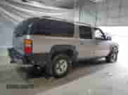 2001 Chevrolet Suburban LT z VIN 3GNGK26G71G219244, wystawiony jako Copart lot #52711915 z przebiegiem Nie podano mil oraz Szkoda całkowita • Salvage title. Historia ofert i sprzedaży dostępna na DreamBid. Obrazek 3.