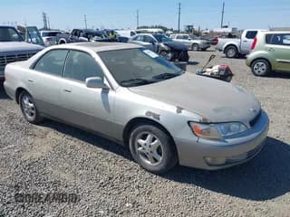 ✅ 1997 Lexus ES 300 • VIN: JT8BF22G7V0029059 • Lot: 42864772. Listed on IAAI with 169,721 mi. Free auction sales archive from the USA and detailed vehicle history report at DreamBid. Image 1.