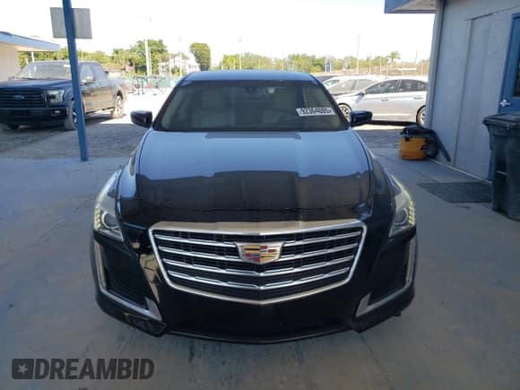 ✅ 2017 Cadillac CTS RWD • VIN: 1G6AP5SX3H0113723 • Lot: 92364685. Wystawiony na Copart z przebiegiem 63 019 mil. Bezpłatny archiwum sprzedaży aukcyjnych z USA i szczegółowy raport historii pojazdu na DreamBid. Zdjęcie 5.