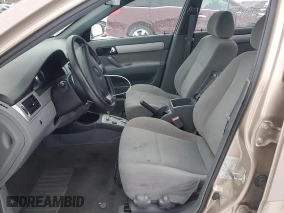✅ 2008 Suzuki Forenza • VIN: KL5JD56ZX8K734808 • Lot: 82396564. Listed on Copart with 105,092 mi. Free auction sales archive from the USA and detailed vehicle history report at DreamBid. Image 7.