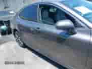 2022 Toyota Camry Hybrid XLE with VIN 4T1F31AK4NU571560, listed as a IAAI auction lot 42654973 with 10,810 mi miles and . Bid and sale history available at DreamBid. Image 13.