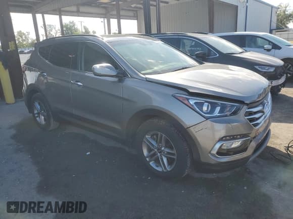 ✅ 2018 Hyundai Santa Fe 2.4L • VIN: 5XYZU3LB3JG556034 • Lot: 90231035. Listed on Copart with 26,542 mi. Free auction sales archive from the USA and detailed vehicle history report at DreamBid. Image 4.