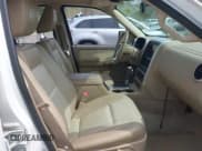 ✅ 2010 Mercury Mountaineer Premier • VIN: 4M2EN4JE0AUJ03609 • Lot: 42130089. Listed on IAAI with 207,795 mi. Free auction sales archive from the USA and detailed vehicle history report at DreamBid. Image 5.