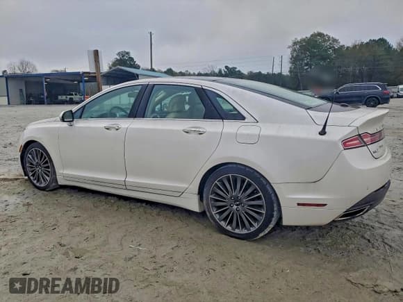 ✅ 2014 Lincoln MKZ • VIN: 3LN6L2G98ER822811 • Lot: 96129305. Wystawiony na Copart z przebiegiem 105 400 mil. Bezpłatny archiwum sprzedaży aukcyjnych z USA i szczegółowy raport historii pojazdu na DreamBid. Zdjęcie 2.