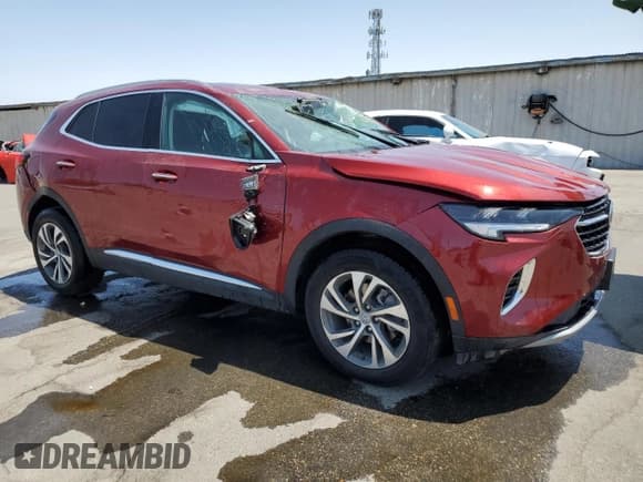 ✅ 2023 Buick Envision Essence • VIN: LRBFZNR4XPD061716 • Lot: 62034995. Listed on Copart with 59,328 mi. Free auction sales archive from the USA and detailed vehicle history report at DreamBid. Image 4.
