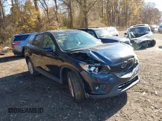 ✅ 2014 Mazda CX-5 Touring • VIN: JM3KE4CY3E0426377 • Lot: 43712899. Wystawiony na IAAI z przebiegiem 96 957 mil. Bezpłatny archiwum sprzedaży aukcyjnych z USA i szczegółowy raport historii pojazdu na DreamBid. Zdjęcie 1.