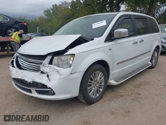 ✅ 2014 Chrysler Town & Country Touring L • VIN: 2C4RC1CG0ER239526 • Lot: 43384005. Listed on IAAI with 128,813 mi. Free auction sales archive from the USA and detailed vehicle history report at DreamBid. Image 6.