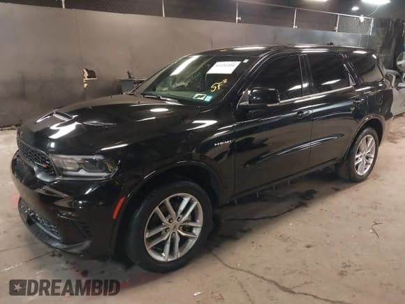 ✅ 2022 Dodge Durango R/T • VIN: 1C4SDHCT2NC224281 • Lot: 41232204. Listed on IAAI with 50,748 mi. Free auction sales archive from the USA and detailed vehicle history report at DreamBid. Image 2.