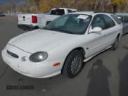 ✅ 1999 Ford Taurus SE • VIN: 1FAFP58S7XA309936 • Lot: 43703596. Wystawiony na IAAI z przebiegiem 221 934 mil. Bezpłatny archiwum sprzedaży aukcyjnych z USA i szczegółowy raport historii pojazdu na DreamBid. Zdjęcie 2.