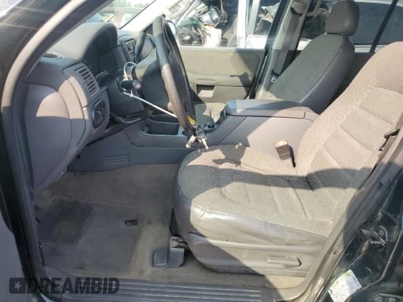 ✅ 2004 Ford Explorer XLS • VIN: 1FMZU72K84ZA96735 • Lot: 59279515. Listed on Copart with 168,803 mi. Free auction sales archive from the USA and detailed vehicle history report at DreamBid. Image 7.