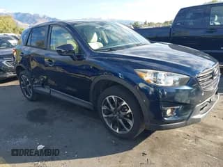 ✅ 2016 Mazda CX-5 Grand Touring • VIN: JM3KE2DY8G0866133 • Lot: 43474326. Wystawiony na IAAI z przebiegiem 164 072 mil. Bezpłatny archiwum sprzedaży aukcyjnych z USA i szczegółowy raport historii pojazdu na DreamBid. Zdjęcie 1.