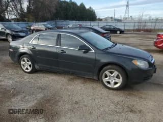 ✅ 2010 Chevrolet Malibu 1LS • VIN: 1G1ZB5E05A4151782 • Lot: 82392534. Listed on Copart with 294,896 mi. Free auction sales archive from the USA and detailed vehicle history report at DreamBid. Image 4.