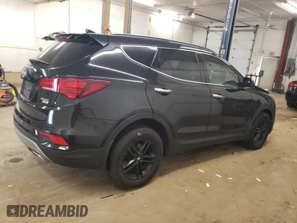 ✅ 2018 Hyundai Santa Fe 2.4L • VIN: 5NMZUDLB8JH056947 • Лот: 57129824. Опубликован ранее на Copart с пробегом 85 007 миль. Бесплатный доступ к архиву аукционных продаж из США и подробный отчёт об истории автомобиля на DreamBid. Изображение 3.
