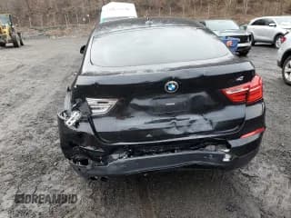 ✅ 2015 BMW X4 xDrive28i • VIN: 5UXXW3C54F0M89256 • Lot: 41388973. Listed on Copart with 136,359 mi. Free auction sales archive from the USA and detailed vehicle history report at DreamBid. Image 6.