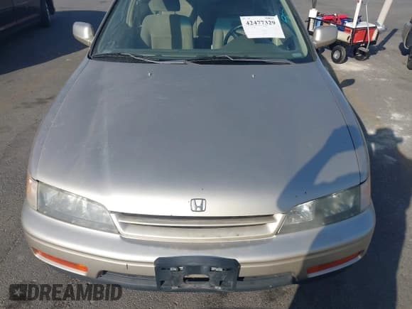 ✅ 1994 Honda Accord EX • VIN: JHMCD5655RC120856 • Lot: 42477329. Wystawiony na IAAI z przebiegiem 258 197 mil. Bezpłatny archiwum sprzedaży aukcyjnych z USA i szczegółowy raport historii pojazdu na DreamBid. Zdjęcie 6.