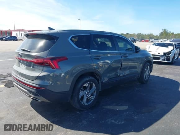 ✅ 2022 Hyundai Santa Fe SE • VIN: 5NMS14AJ2NH402596 • Lot: 43690633. Listed on IAAI with 29,972 mi. Free auction sales archive from the USA and detailed vehicle history report at DreamBid. Image 4.