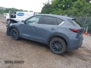 ✅ 2023 Mazda CX-5 S Carbon Edition • VIN: JM3KFBCM4P0142175 • Lot: 42523647. Listed on IAAI with 48,655 mi. Free auction sales archive from the USA and detailed vehicle history report at DreamBid. Image 3.