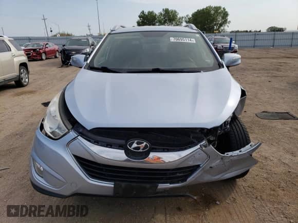 2011 Hyundai Tucson Limited z VIN KM8JU3AC3BU127903, wystawiony jako Copart lot #70695114 z przebiegiem 130 796 mil mil oraz Szkoda całkowita • Salvage title. Historia ofert i sprzedaży dostępna na DreamBid. Obrazek 5.