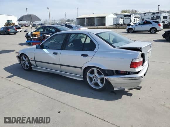 1998 BMW 3 Series 328i with VIN WBACD4322WAV65078, listed as a Copart auction lot 48259125 with 158,640 mi miles and Salvage title. Bid and sale history available at DreamBid. Image 2.