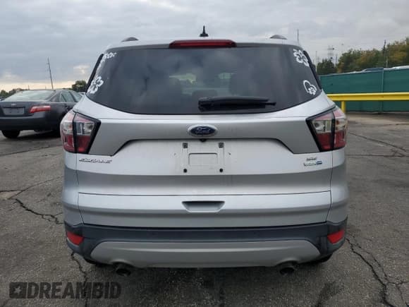 ✅ 2017 Ford Escape SE • VIN: 1FMCU9GDXHUC09809 • Lot: 82038585. Listed on Copart with 120,644 mi. Free auction sales archive from the USA and detailed vehicle history report at DreamBid. Image 6.