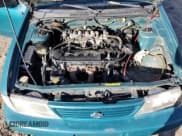 ✅ 1997 Nissan Sentra XE • VIN: 3N1AB41D7VL006933 • Lot: 86178884. Wystawiony na Copart z przebiegiem 382 905 mil. Bezpłatny archiwum sprzedaży aukcyjnych z USA i szczegółowy raport historii pojazdu na DreamBid. Zdjęcie 11.