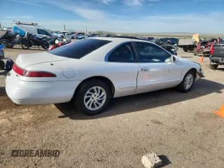 ✅ 1996 Lincoln Mark VIII • VIN: 1LNLM91V0TY724188 • Lot: 84204745. Listed on Copart with 57,932 mi. Free auction sales archive from the USA and detailed vehicle history report at DreamBid. Image 3.