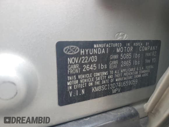 ✅ 2004 Hyundai Santa Fe GLS • VIN: KM8SC13D74U659059 • Lot: 57156945. Listed on Copart with 141,881 mi. Free auction sales archive from the USA and detailed vehicle history report at DreamBid. Image 14.
