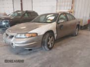✅ 2002 Pontiac Bonneville SLE • VIN: 1G2HY54K024229962 • Lot: 42345894. Wystawiony na IAAI z przebiegiem 153 719 mil. Bezpłatny archiwum sprzedaży aukcyjnych z USA i szczegółowy raport historii pojazdu na DreamBid. Zdjęcie 2.