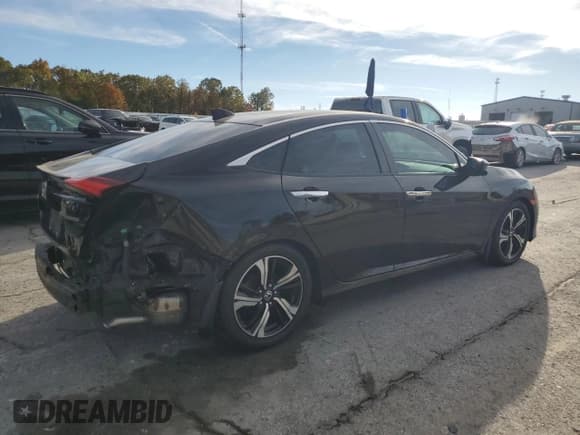 ✅ 2016 Honda Civic Touring • VIN: 19XFC1F99GE003364 • Lot: 90372945. Listed on Copart with 132,229 mi. Free auction sales archive from the USA and detailed vehicle history report at DreamBid. Image 3.