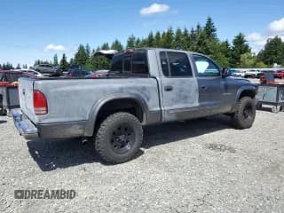 ✅ 2002 Dodge Dakota SLT • VIN: 1B7HG48N02S548464 • Lot: 58943135. Wystawiony na Copart z przebiegiem 239 081 mil. Bezpłatny archiwum sprzedaży aukcyjnych z USA i szczegółowy raport historii pojazdu na DreamBid. Zdjęcie 3.