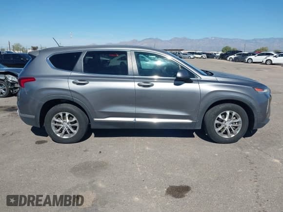 ✅ 2019 Hyundai Santa Fe SE • VIN: 5NMS23AD8KH030713 • Lot: 43592667. Wystawiony na IAAI z przebiegiem 74 344 mil. Bezpłatny archiwum sprzedaży aukcyjnych z USA i szczegółowy raport historii pojazdu na DreamBid. Zdjęcie 13.