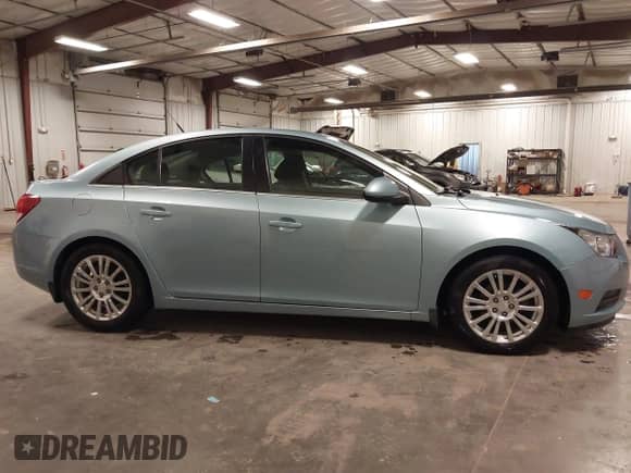 2012 Chevrolet Cruze ECO z VIN 1G1PJ5SCXC7172847, wystawiony jako IAAI lot #43376111 z przebiegiem 80 607 mil mil oraz . Historia ofert i sprzedaży dostępna na DreamBid. Obrazek 13.