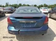 ✅ 2005 Pontiac Grand Prix • VIN: 2G2WP522451280698 • Lot: 63109435. Wystawiony na Copart z przebiegiem Nie podano. Bezpłatny archiwum sprzedaży aukcyjnych z USA i szczegółowy raport historii pojazdu na DreamBid. Zdjęcie 6.